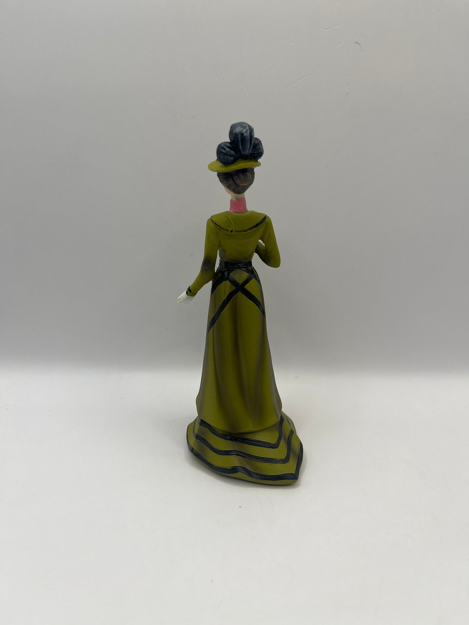 Resin lady in green dress