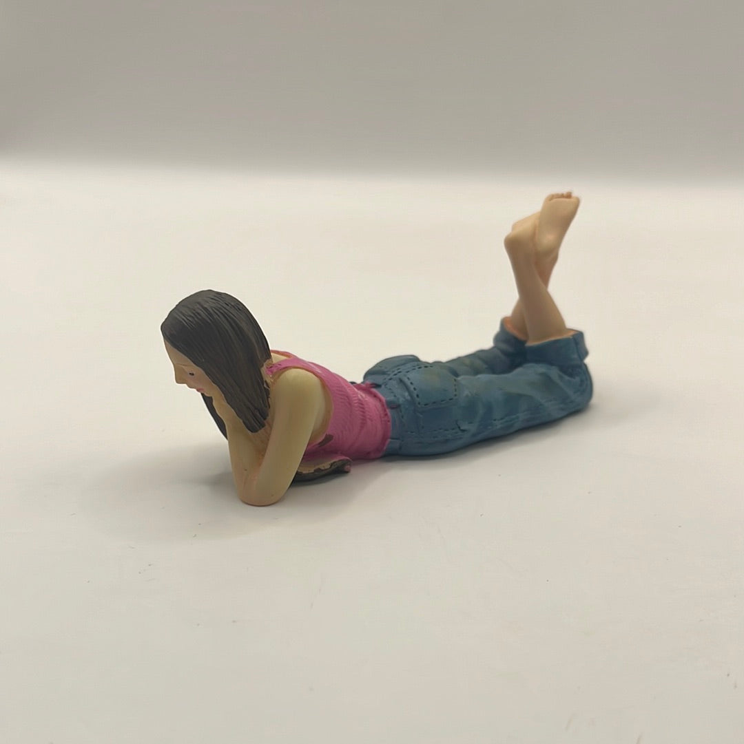 Modern resin teenage lounging girl