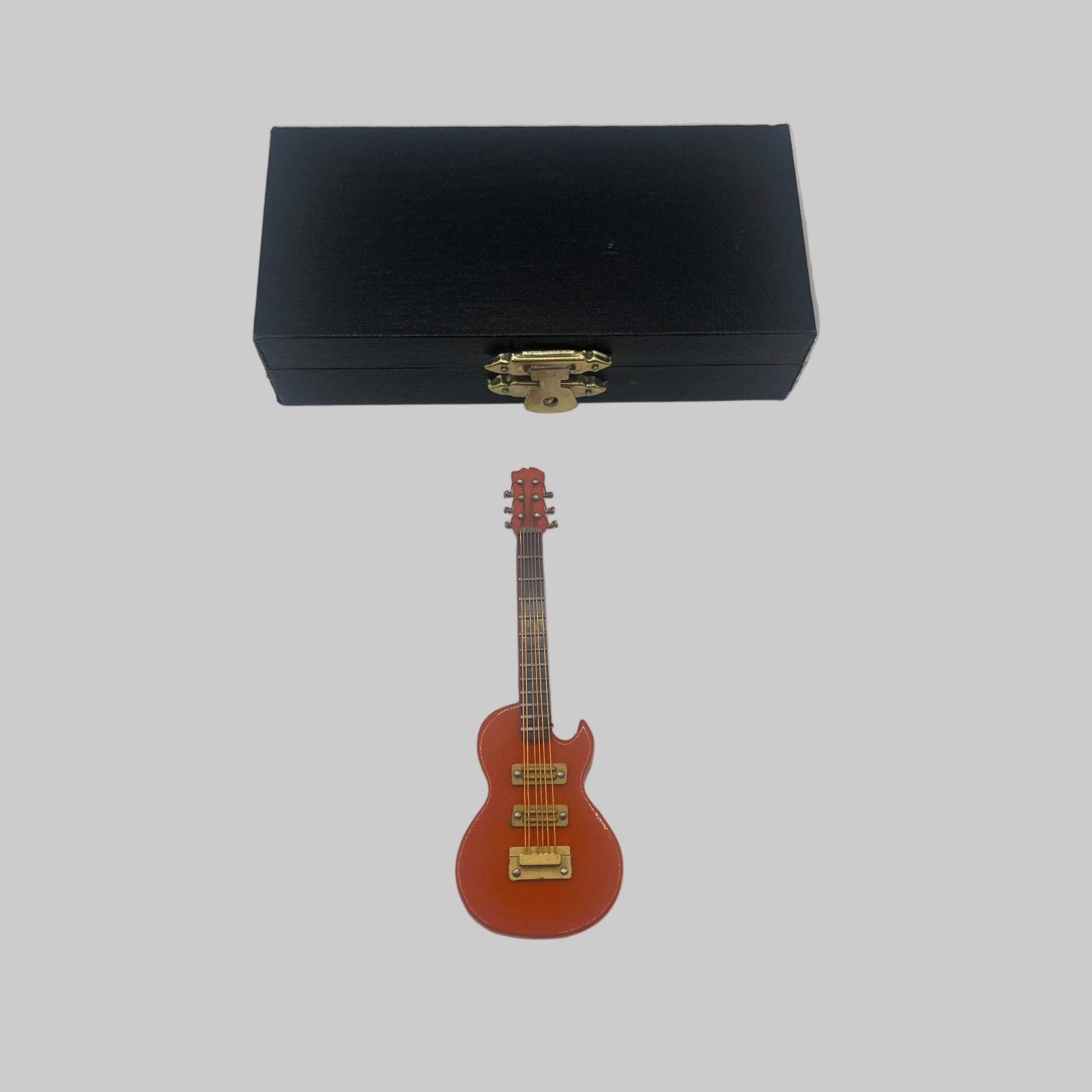 Orange Gibson electric guitar