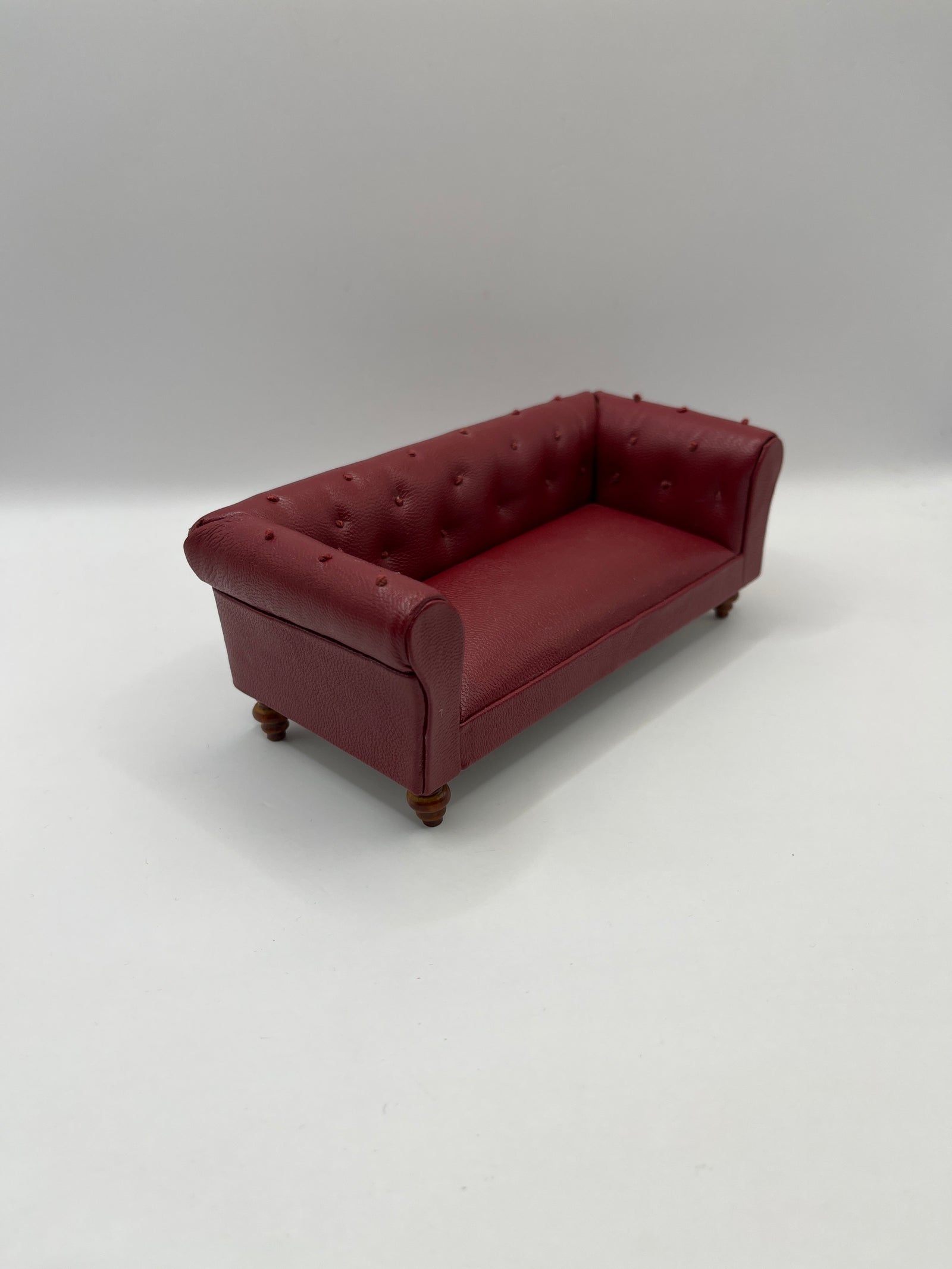 Red leather chesterfield sofa