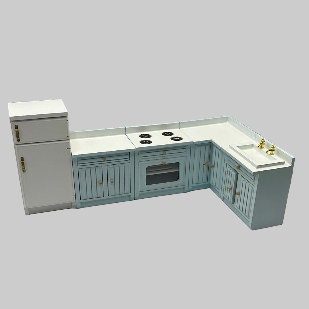 Fitted kitchen with fridge freezer