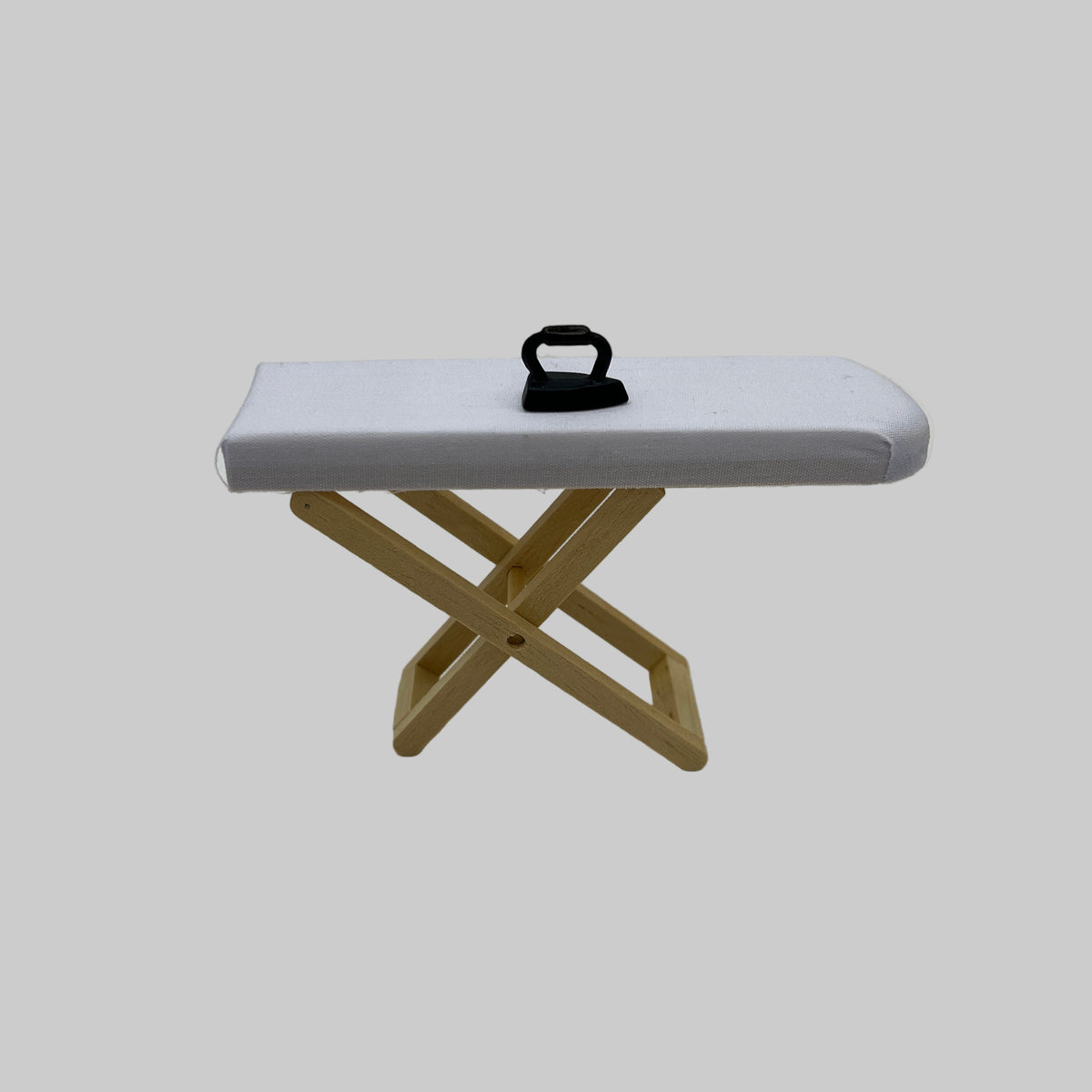 Dolls house iron and ironing board
