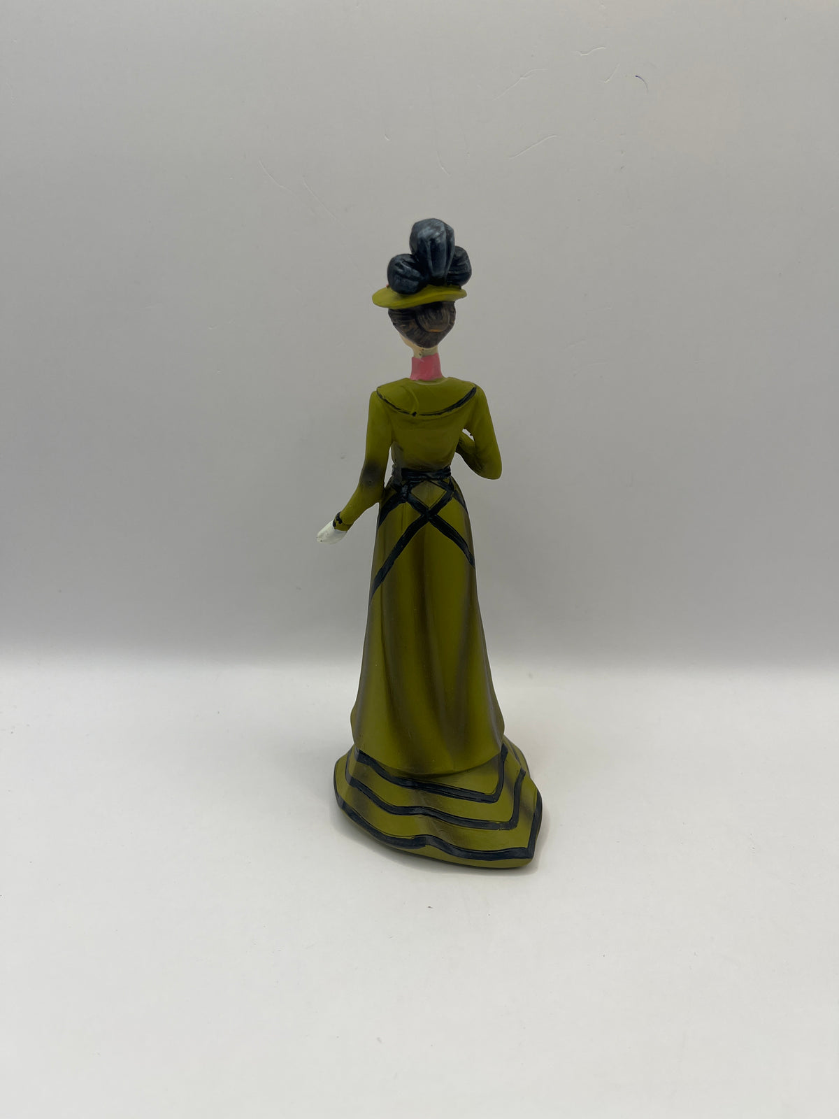 Resin lady in green dress