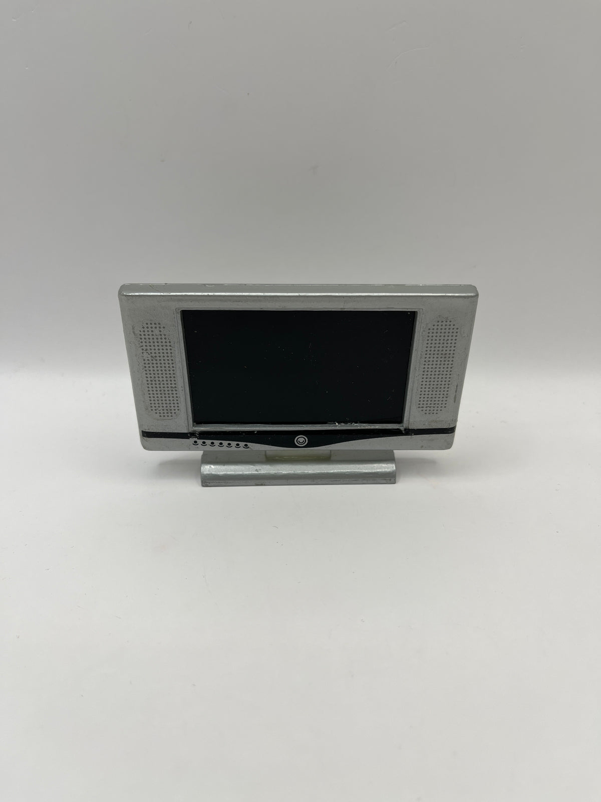 D1161 - Silver flat screen television