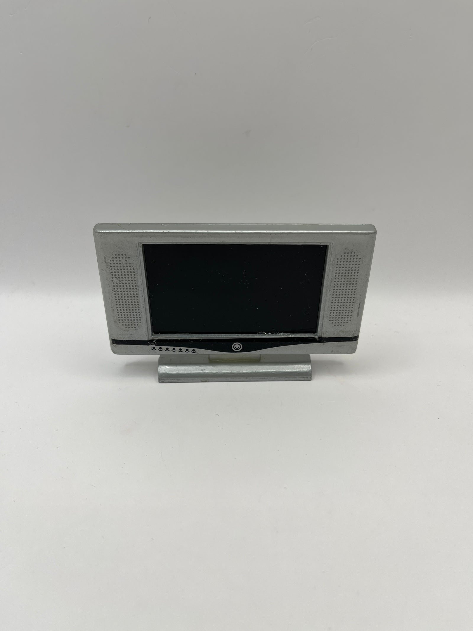 D1161 - Silver flat screen television