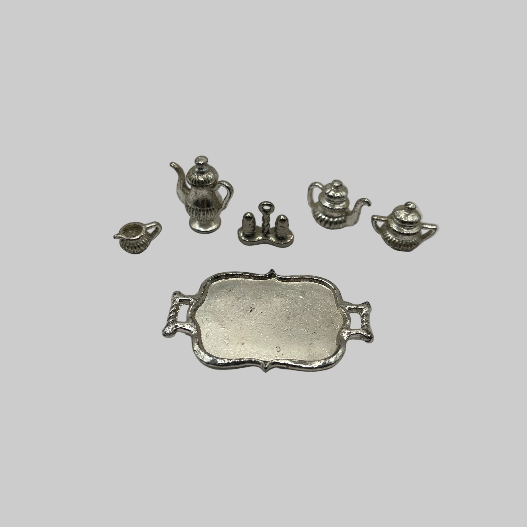 Silver tea set on tray