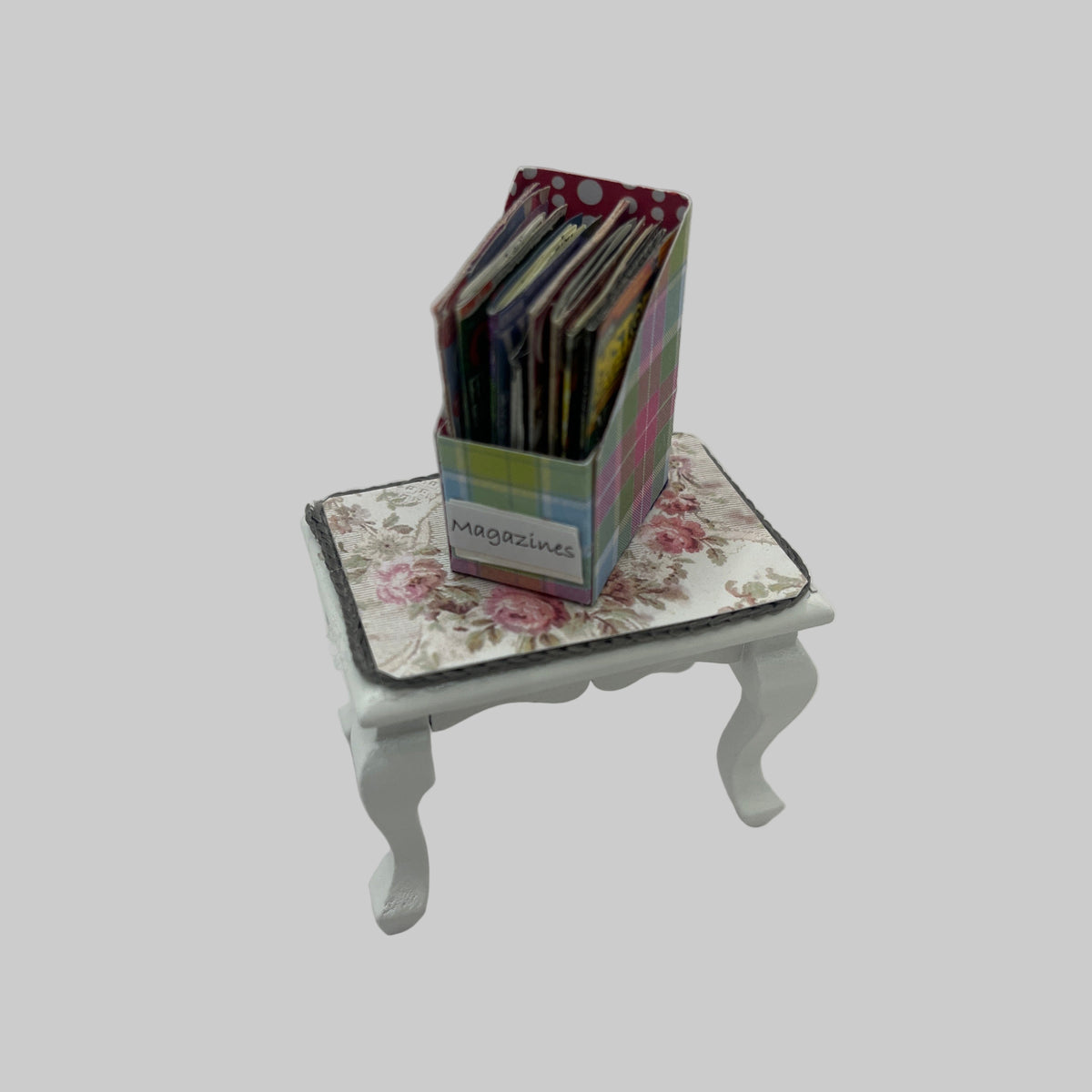 Dolls house magazines in folder