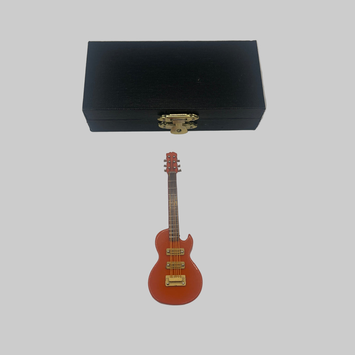 Orange Gibson electric guitar