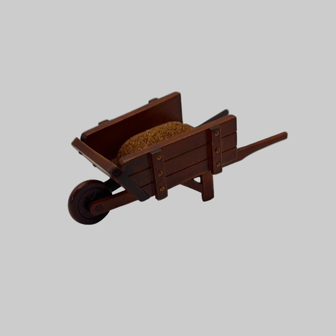 ACC644 - Filled wooden wheelbarrow