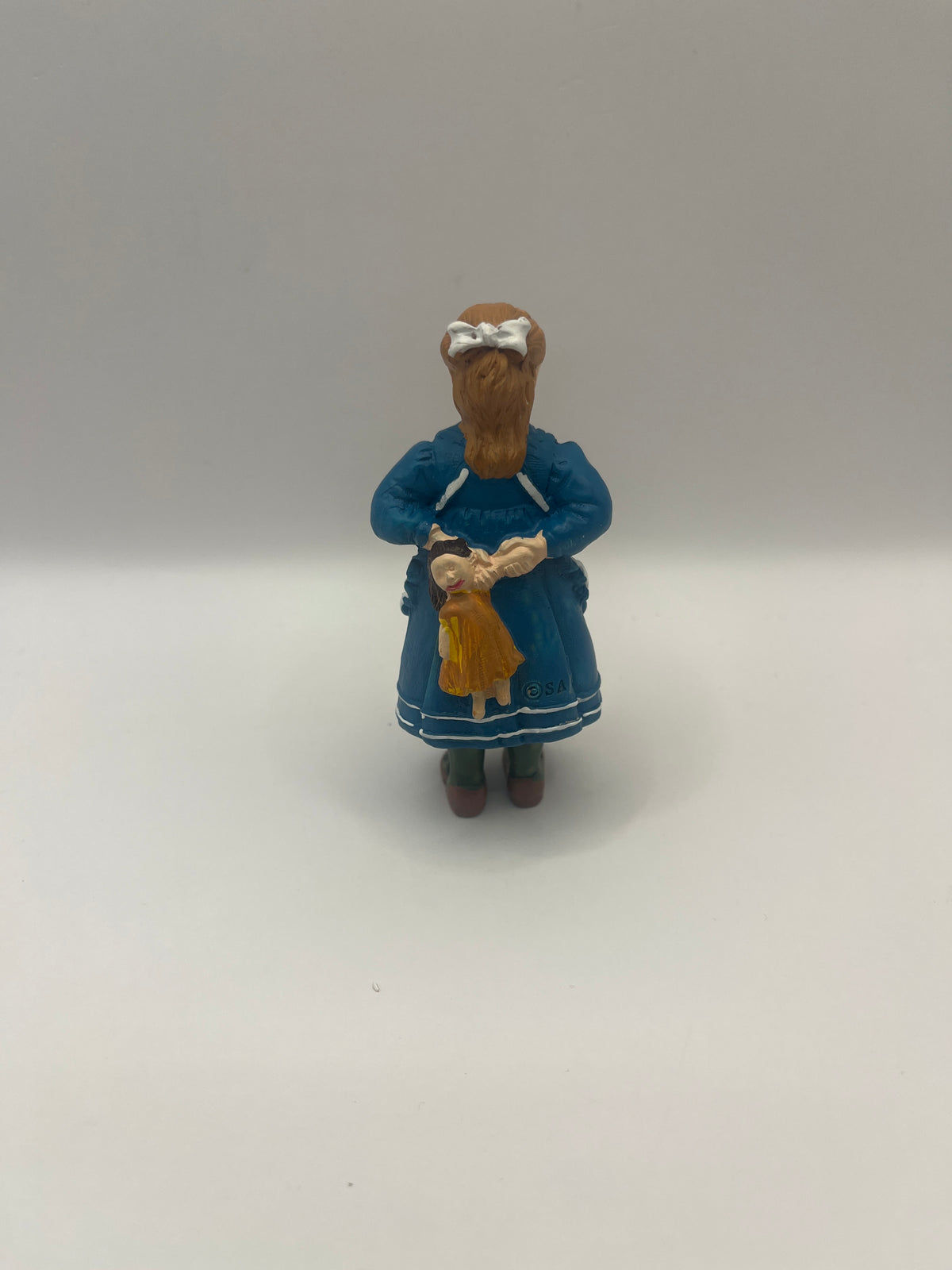 Resin girl with doll