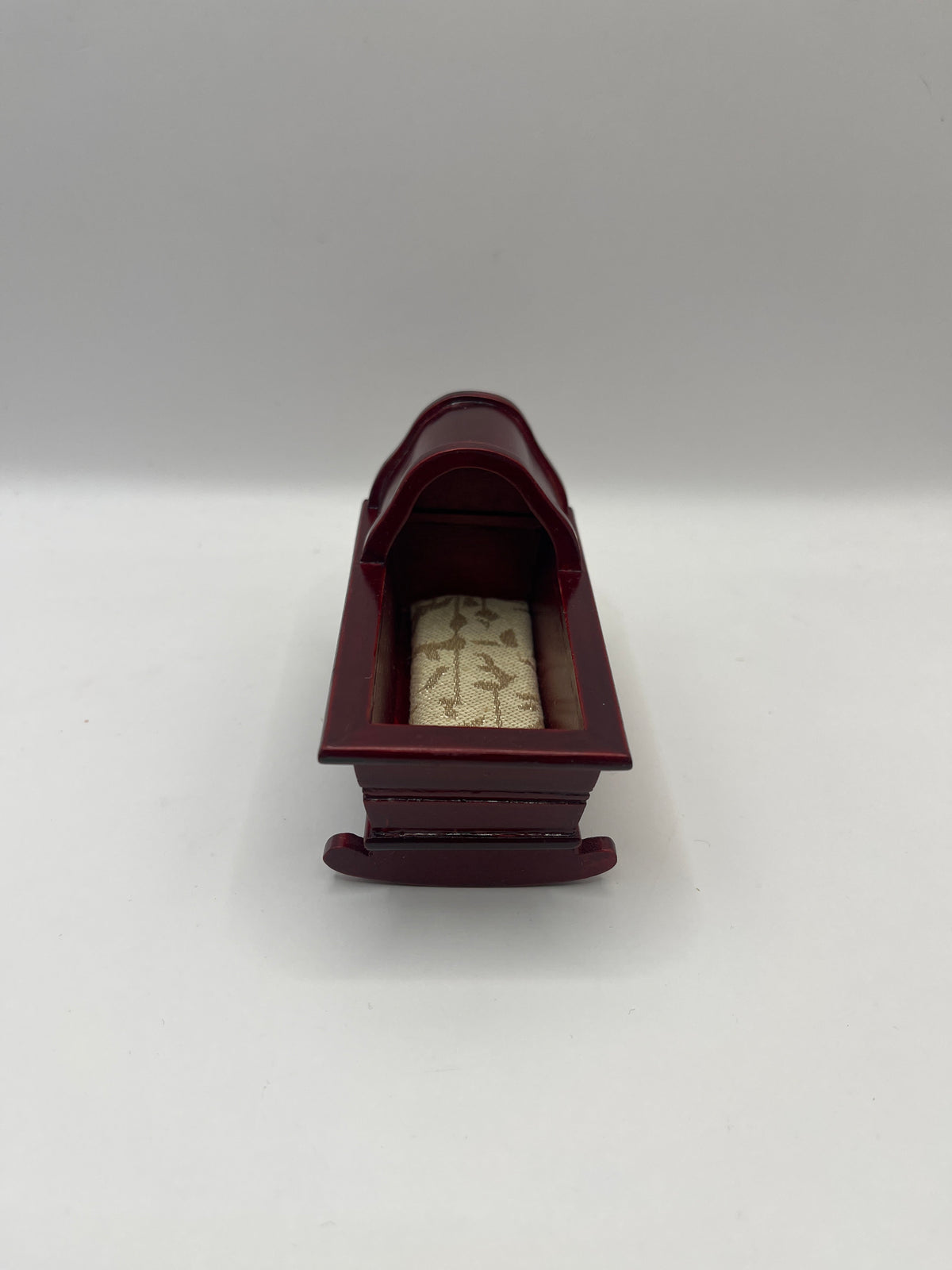 Mahogany rocking crib