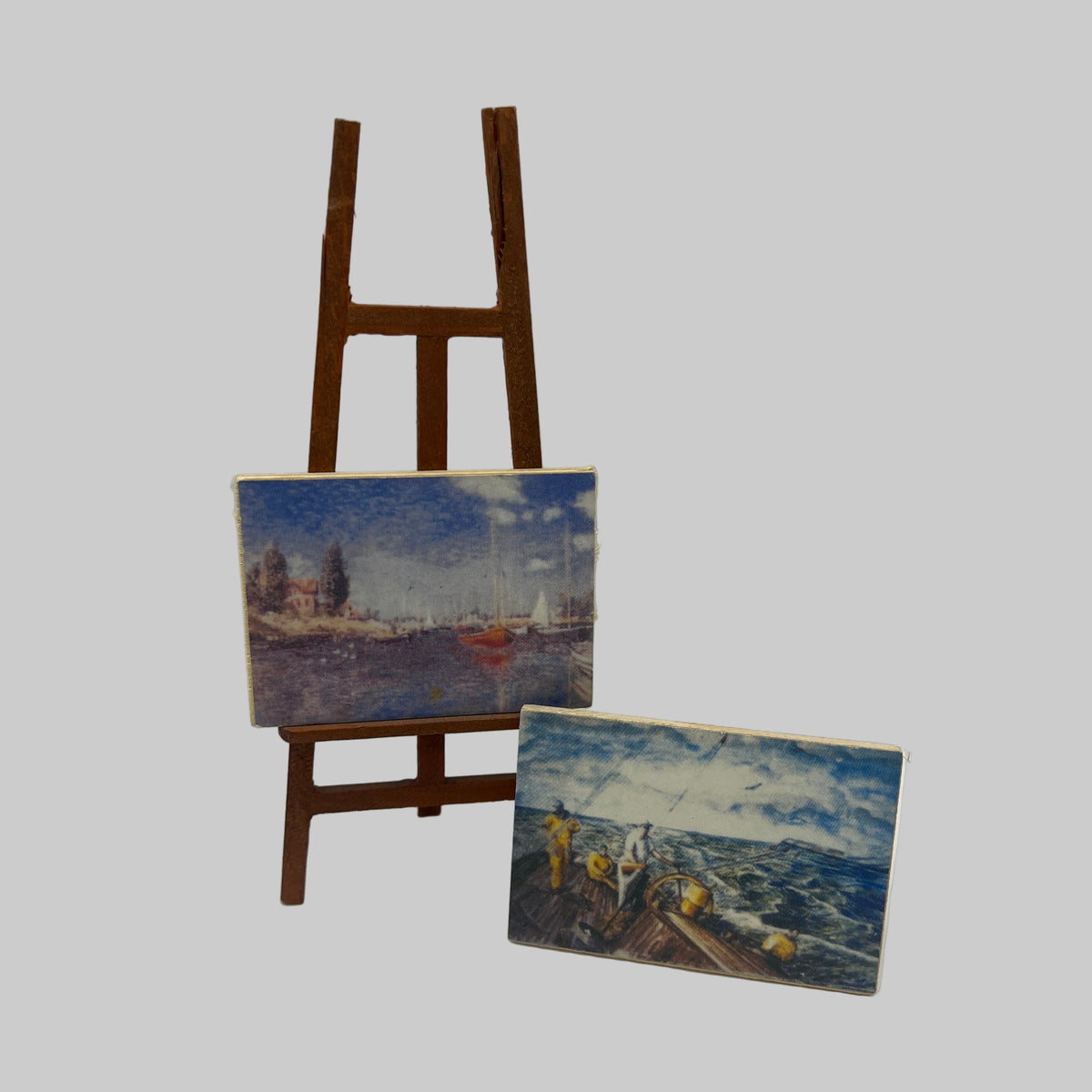 ACC146 - Artists easel with 2 paintings