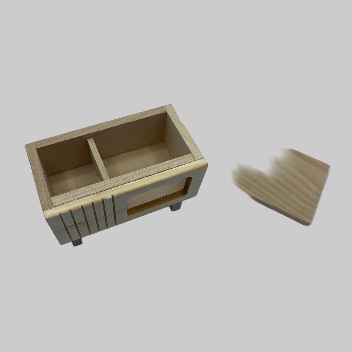 Bare wood rabbit hutch