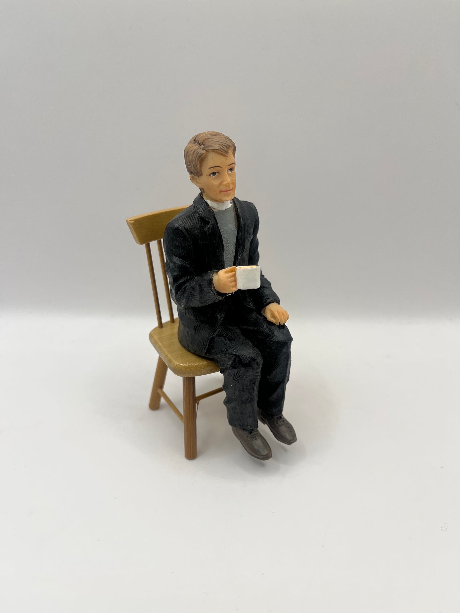 DP312 - Vicar drinking tea
