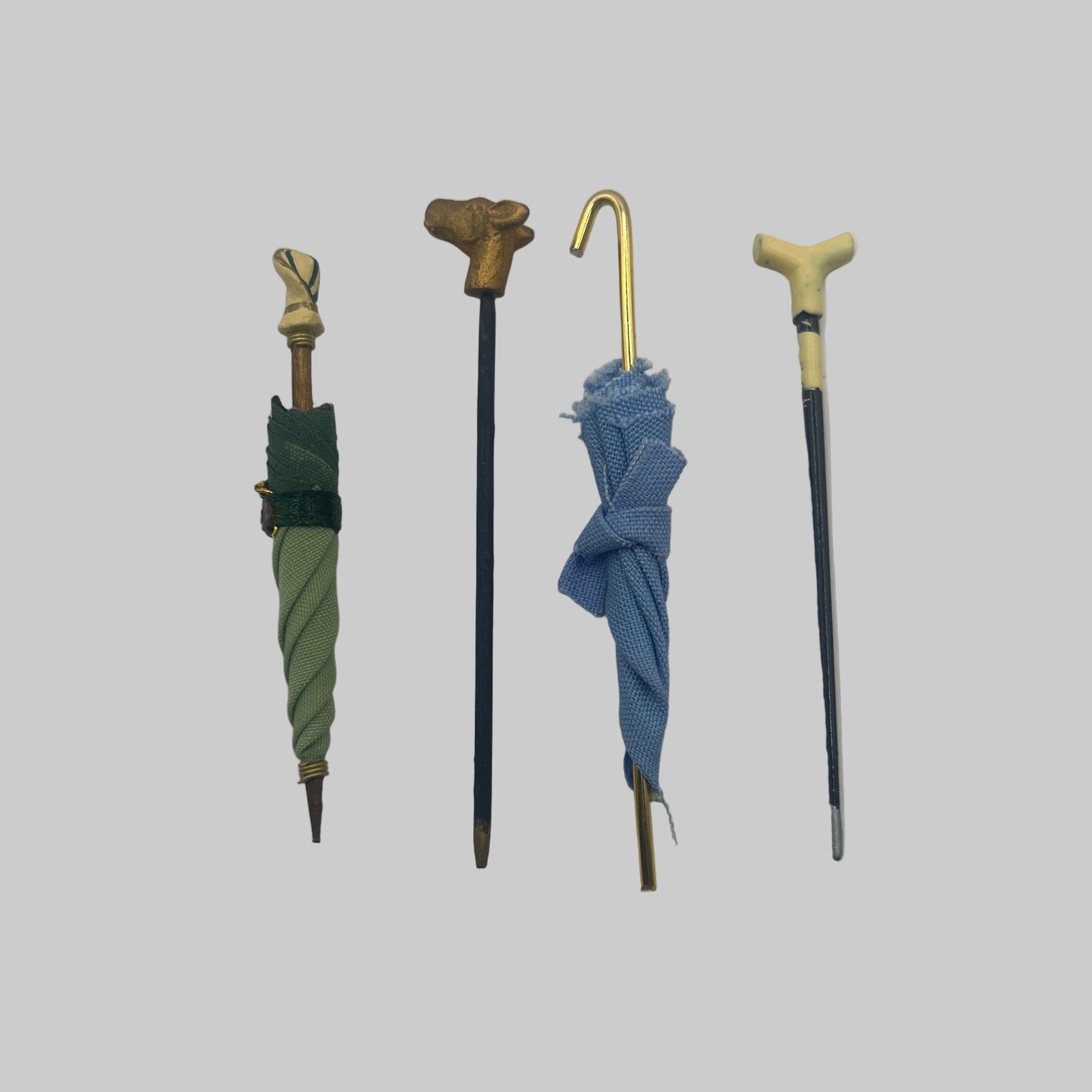Dolls house parasols and walking sticks