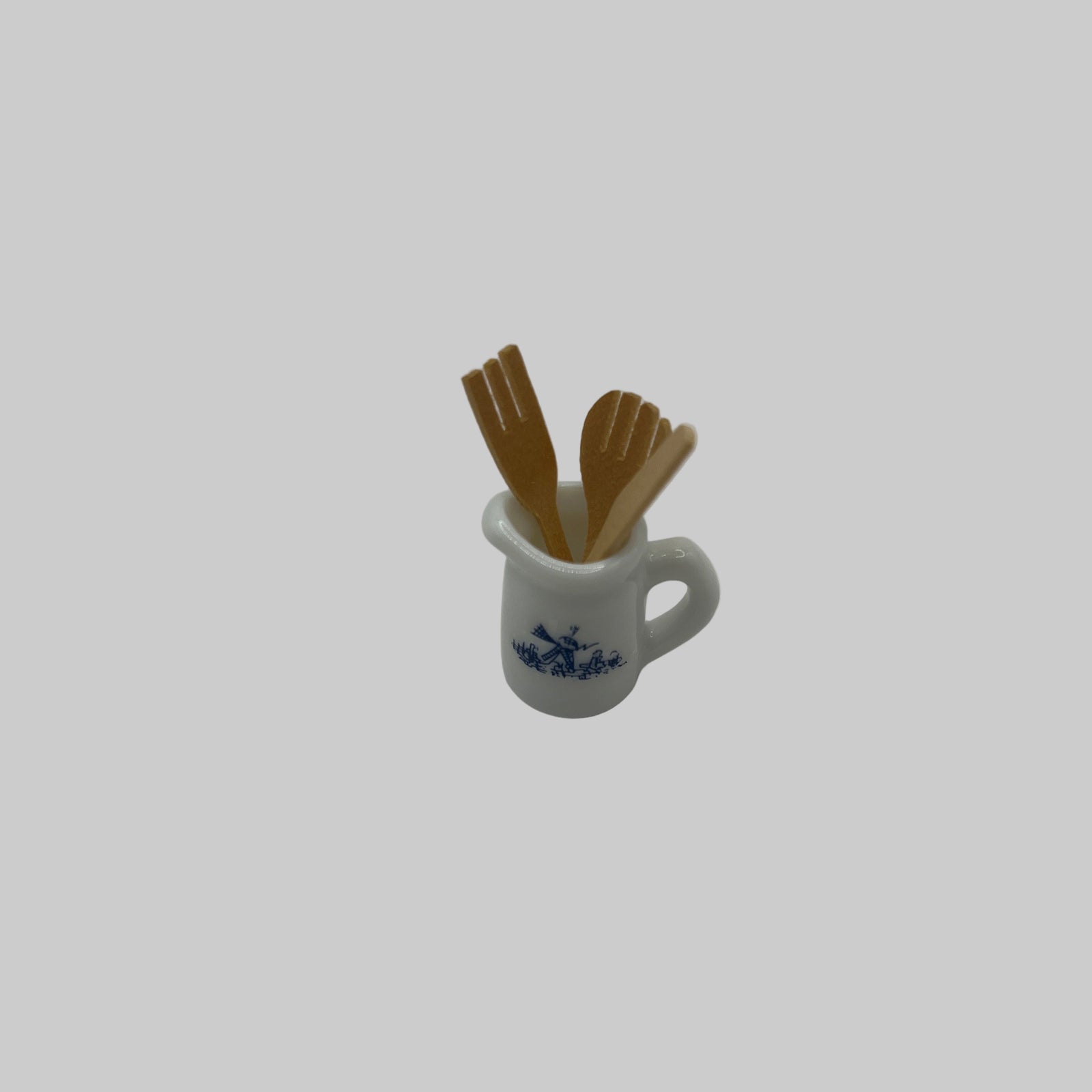 Kitchen utensils in jug