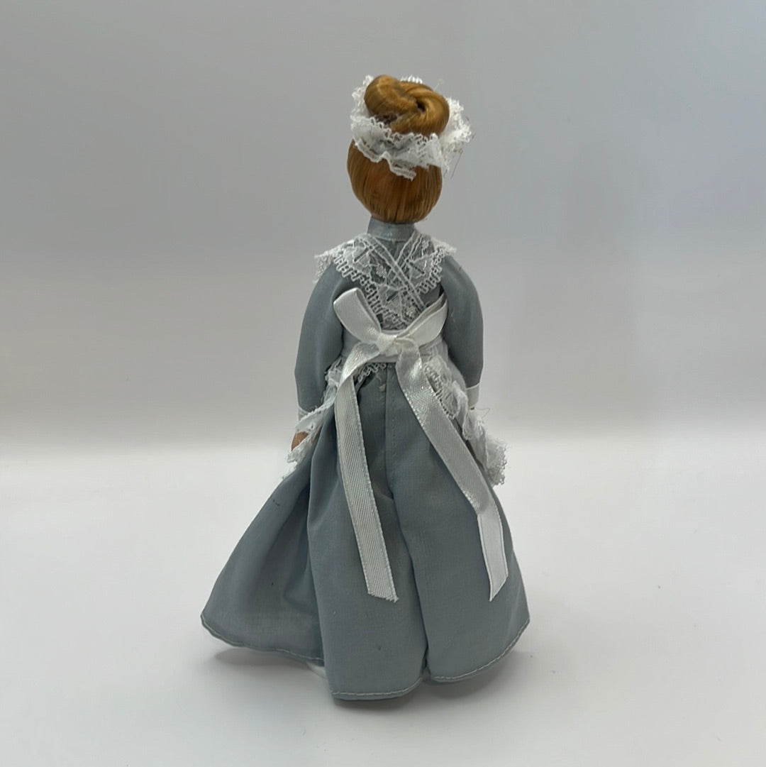 Maid in grey dress