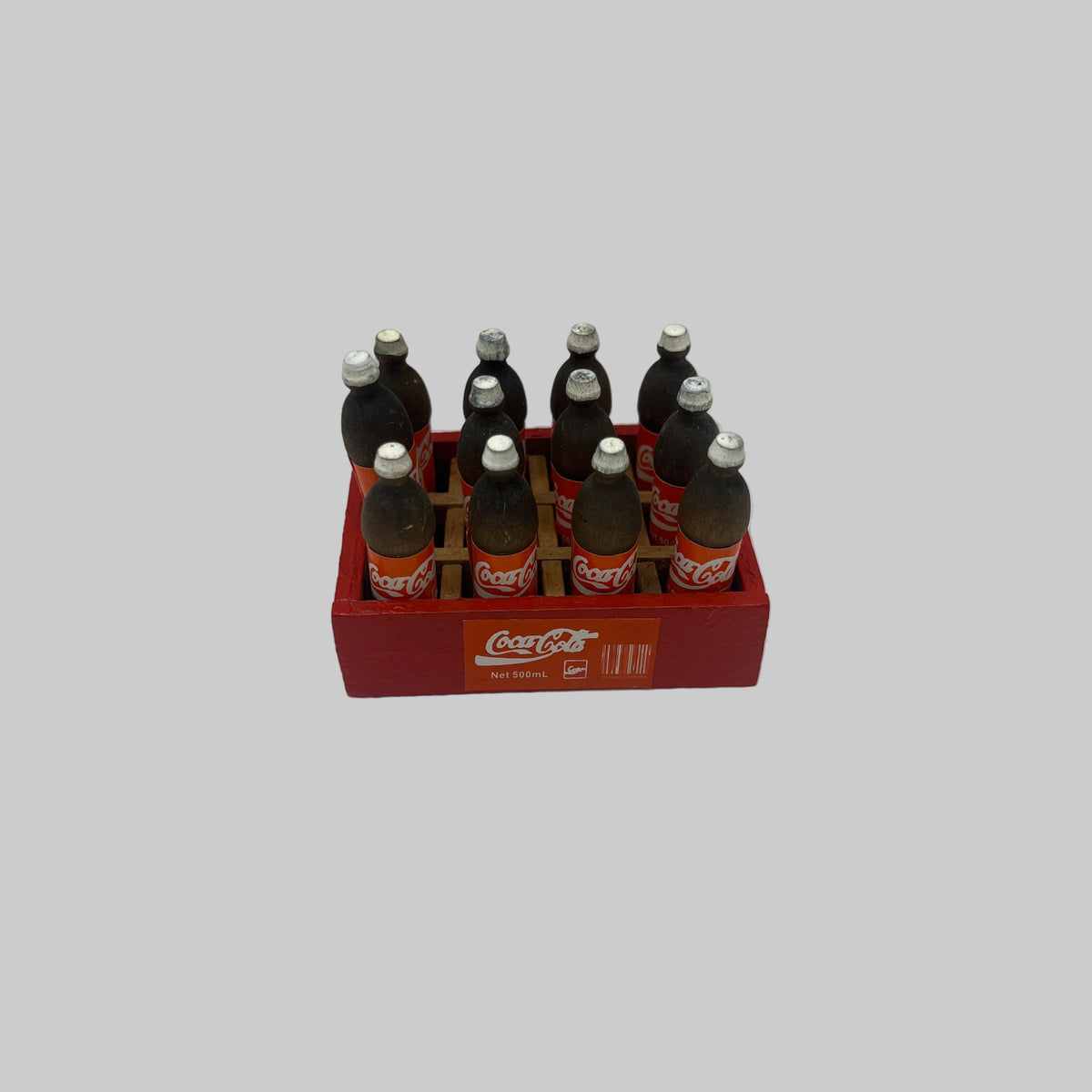 D1243 - Bottles of cola in crate