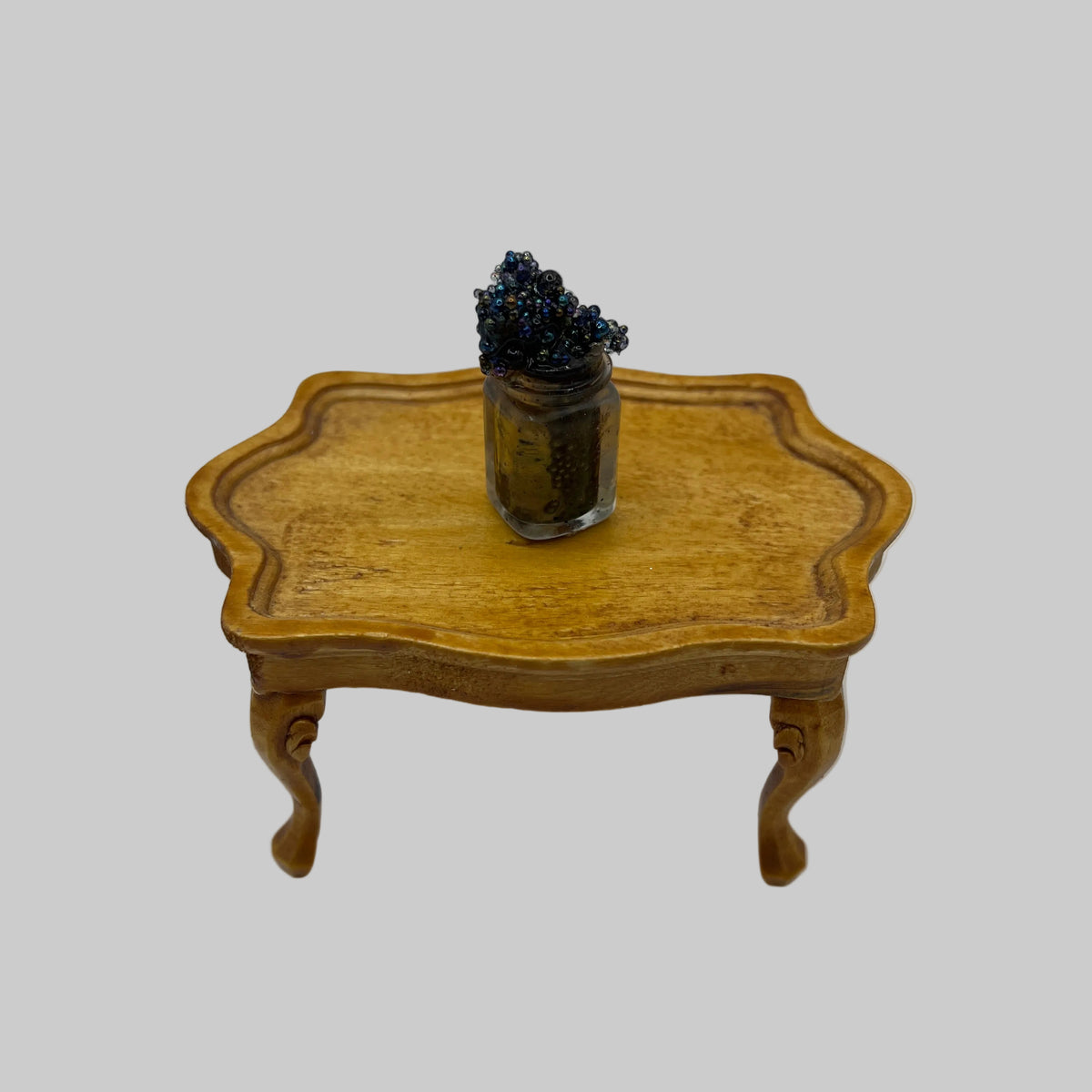 Dolls house bubbling potion bottle