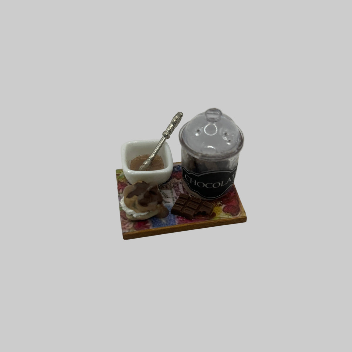 Dolls house chocolate cake prep board