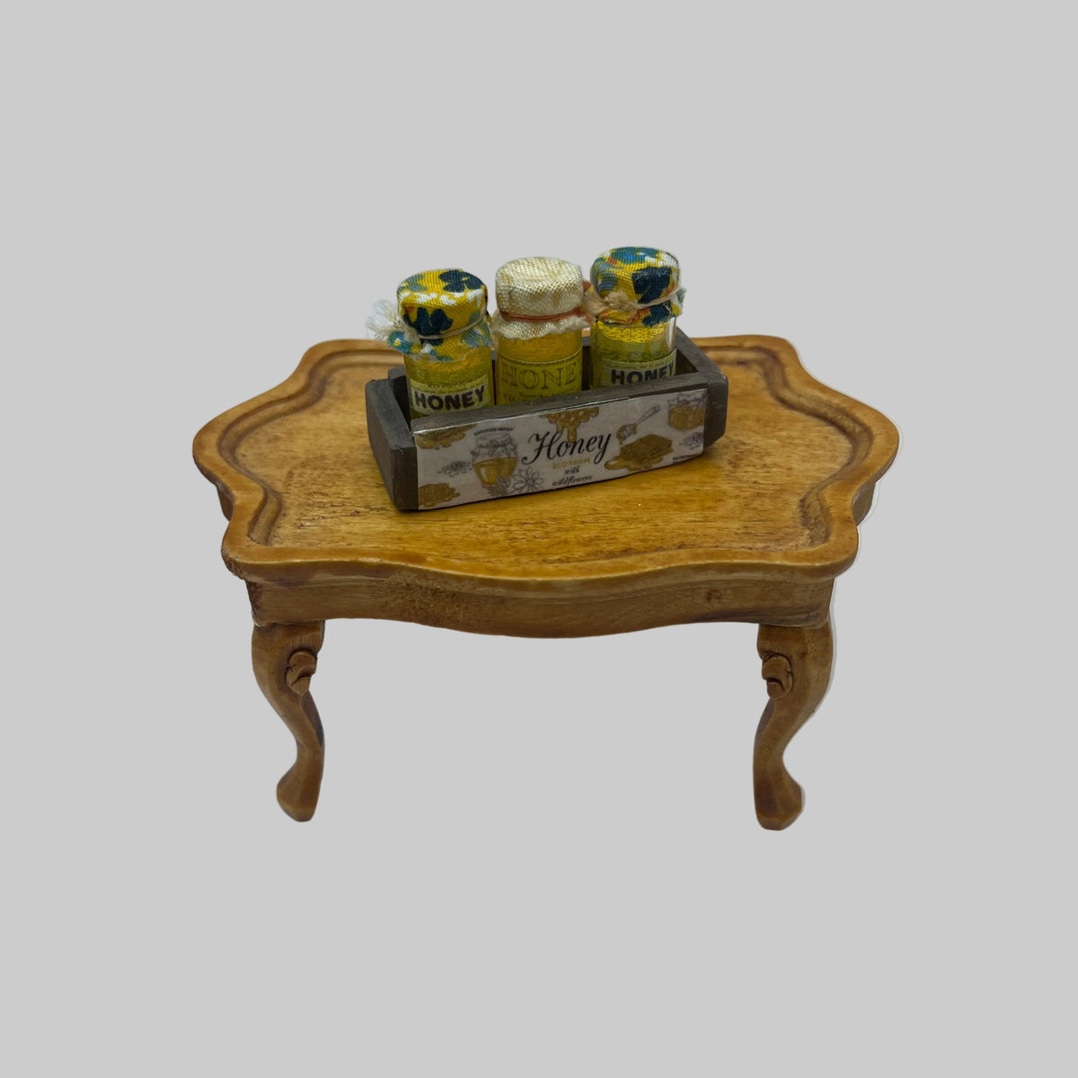 Dolls house crate of honey jars