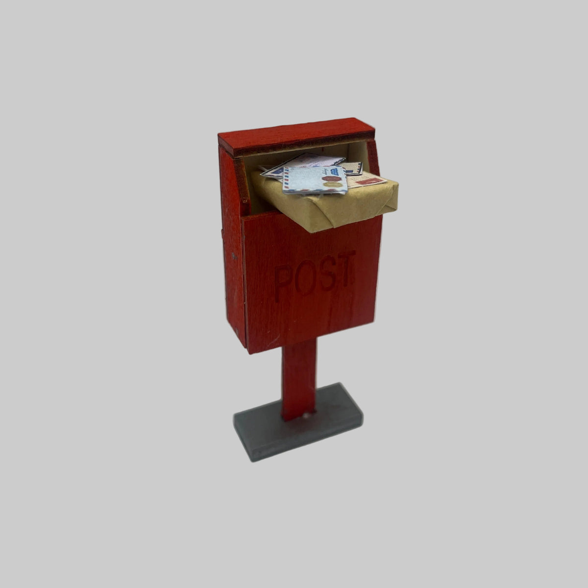 Dolls house filled post box