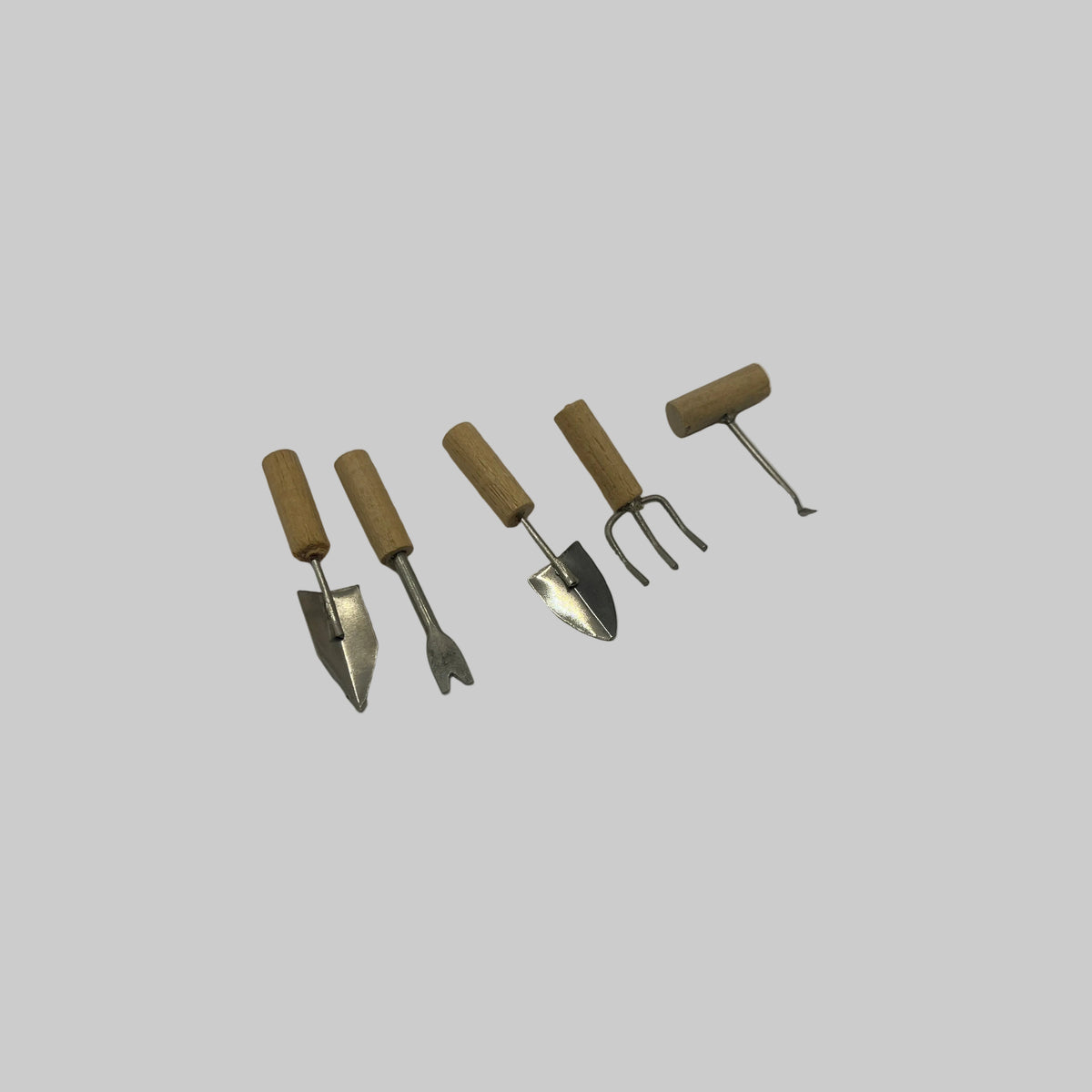 Dolls house gardening tools