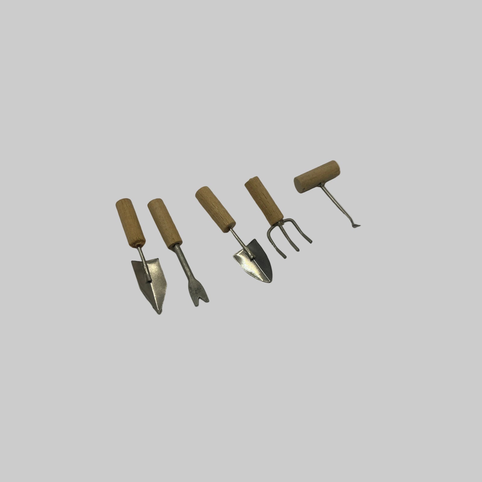 Dolls house gardening tools
