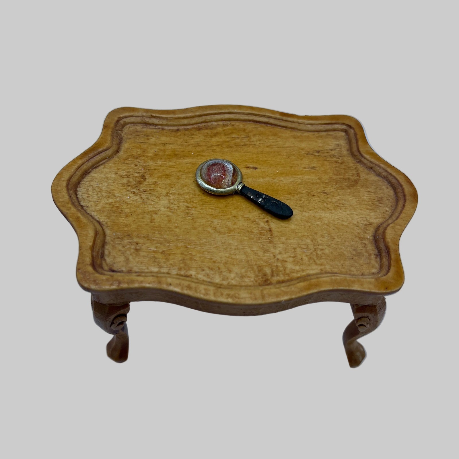 Dolls house magnifying glass
