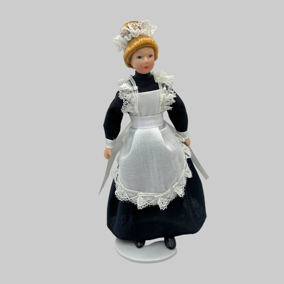 Dolls house maid doll in black and white