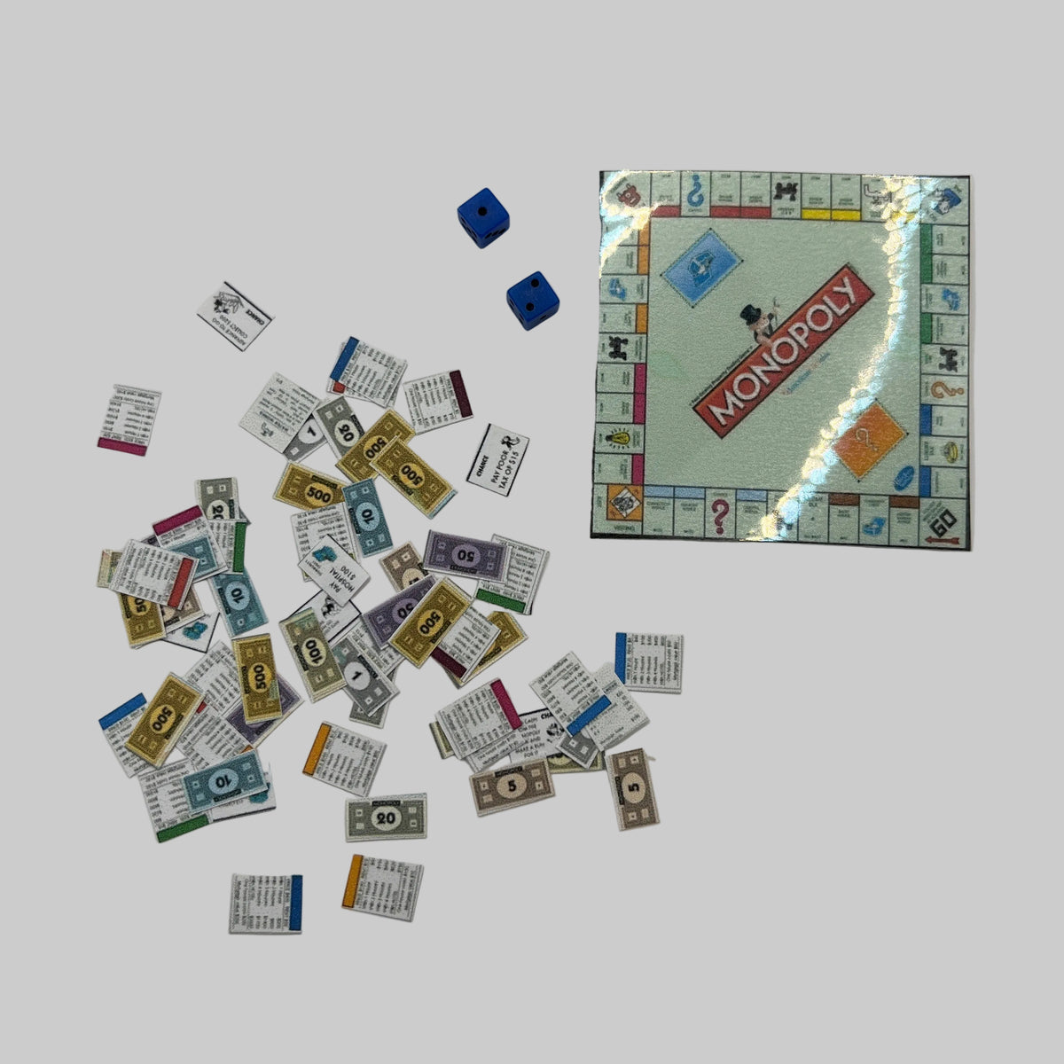 Dolls house monopoly with money and cards