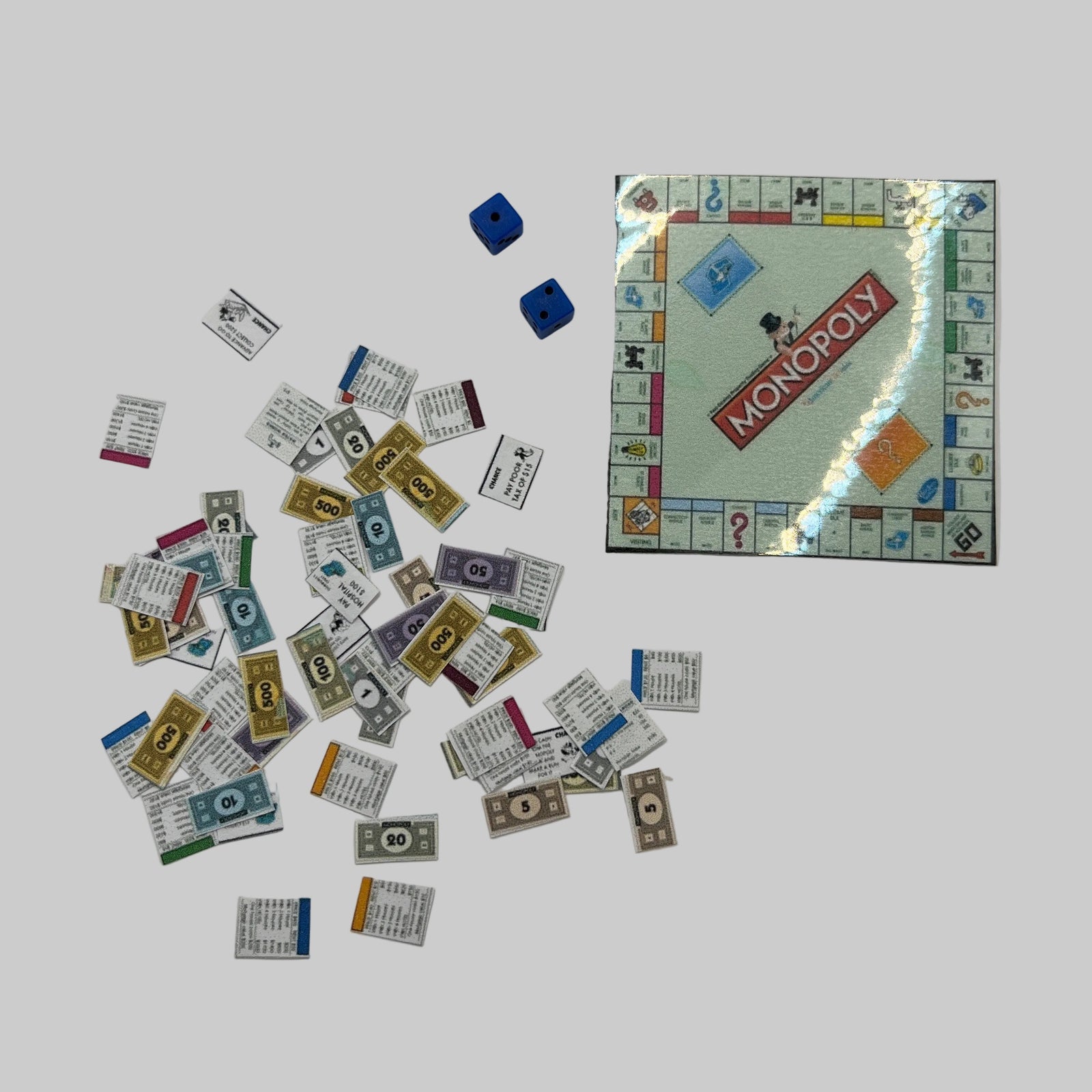 Dolls house monopoly with money and cards