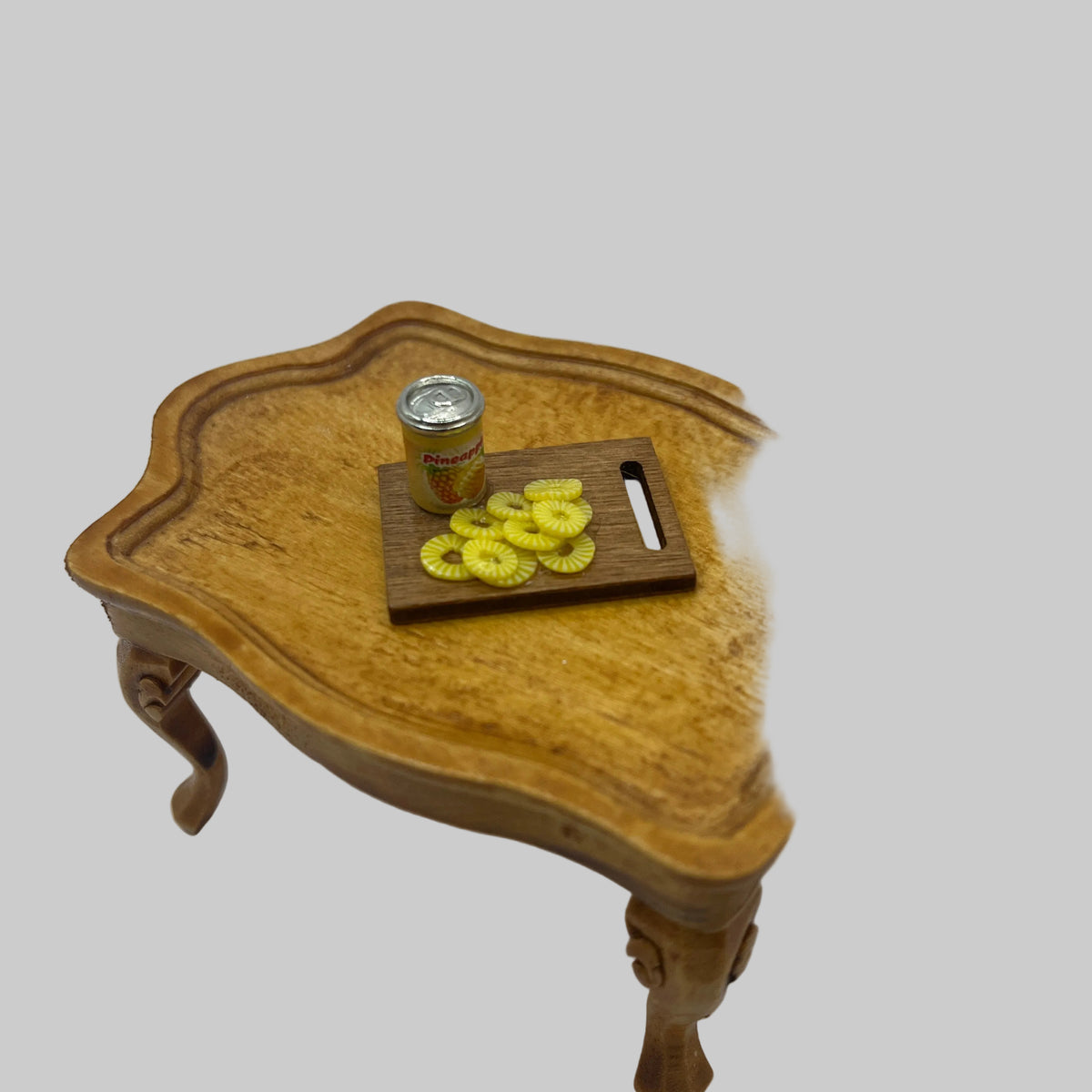 Dolls house pineapple on board
