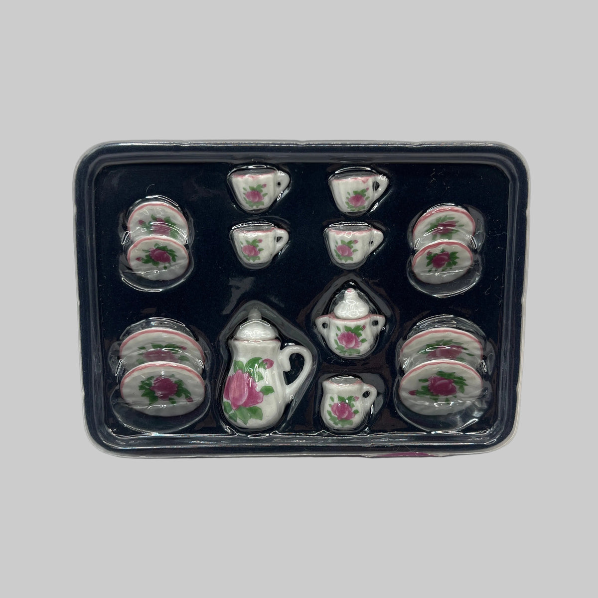 Dolls house Pink rimmed tea set