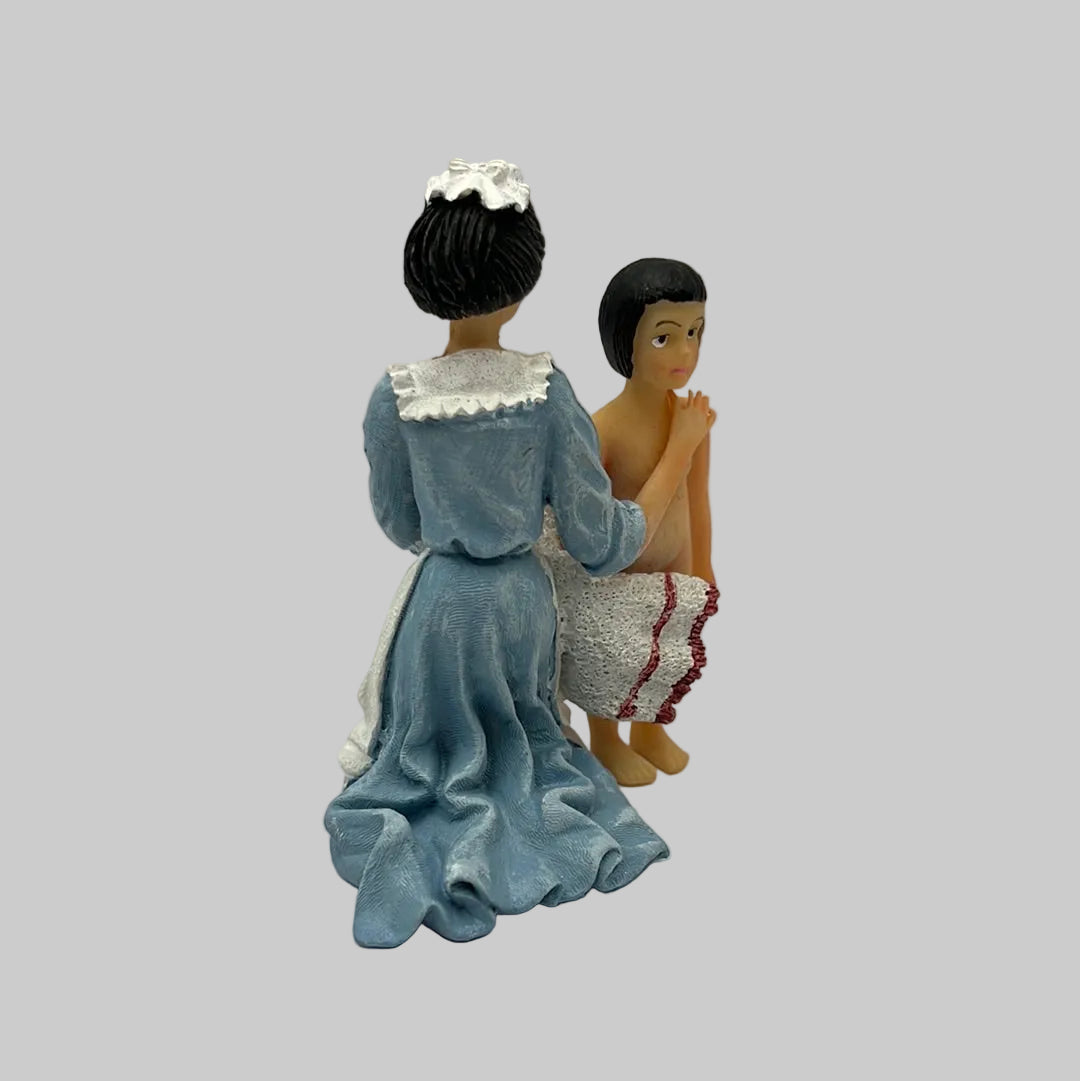 Dolls house resin maid figure drying a child