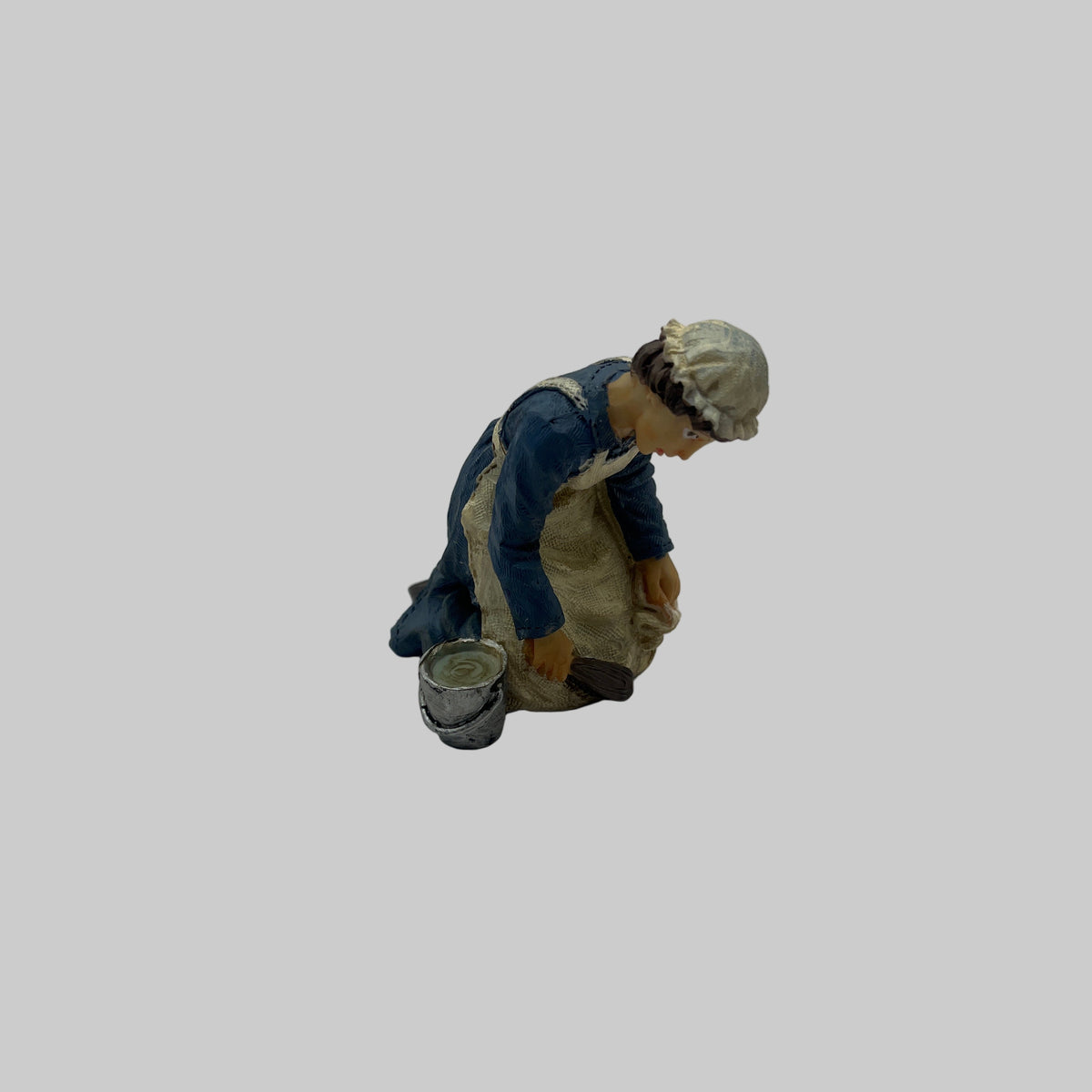 dolls house maid scrubbing the floor