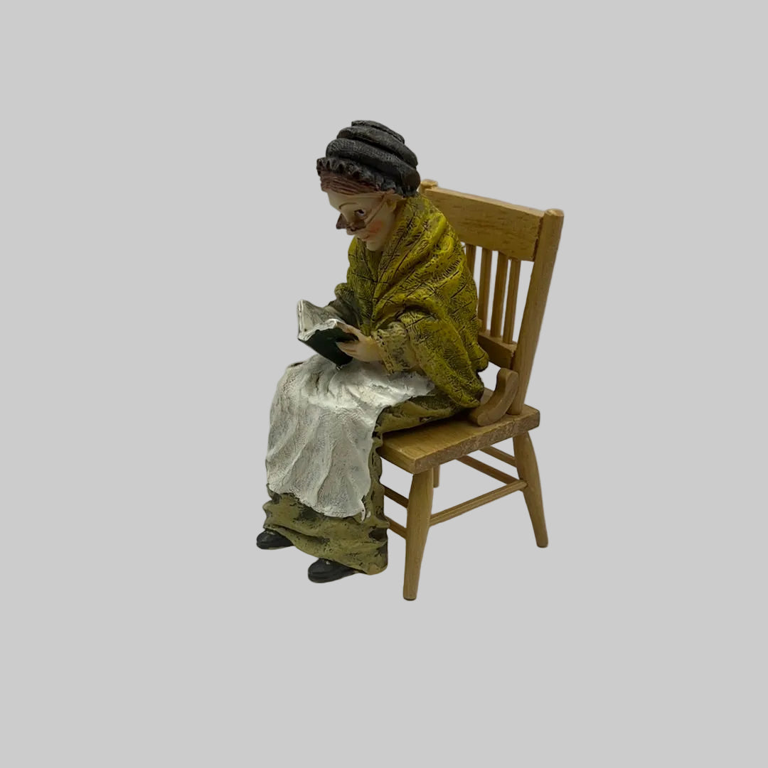 Dolls house Resin seated old lady reading