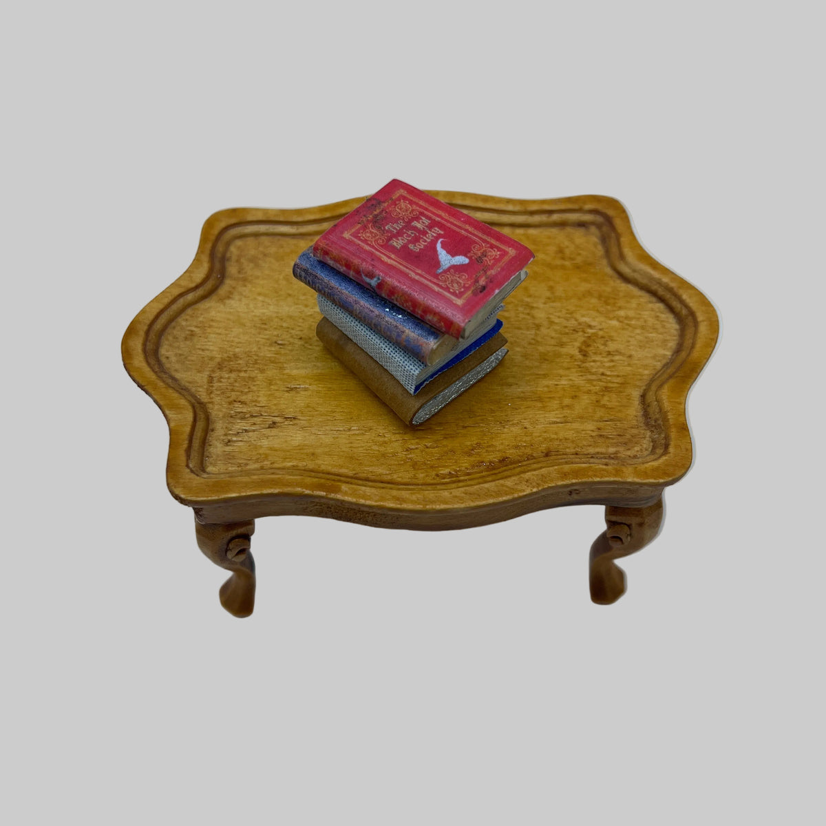 Dolls house stack of books 1
