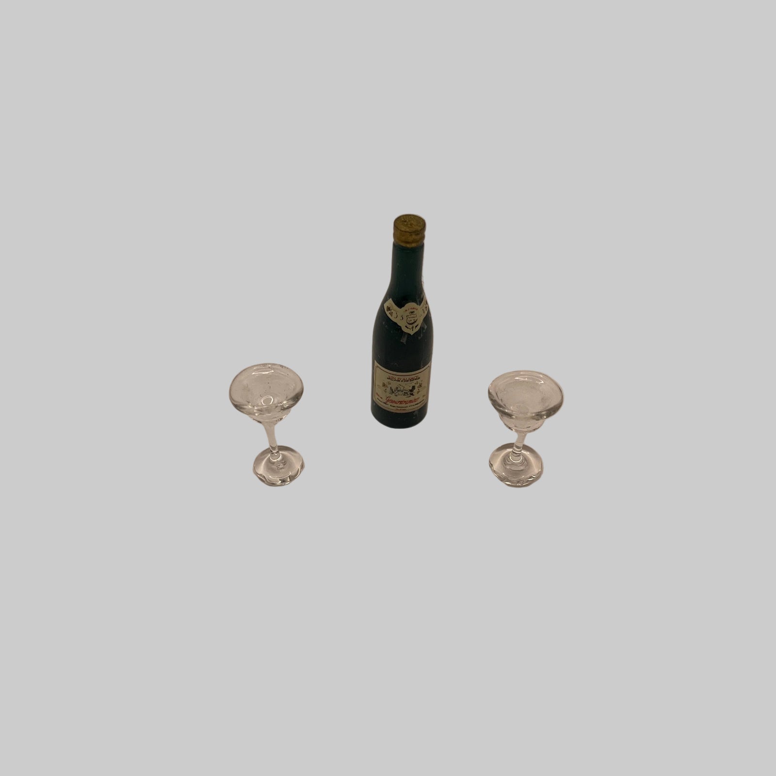 Dolls house wine and glasses