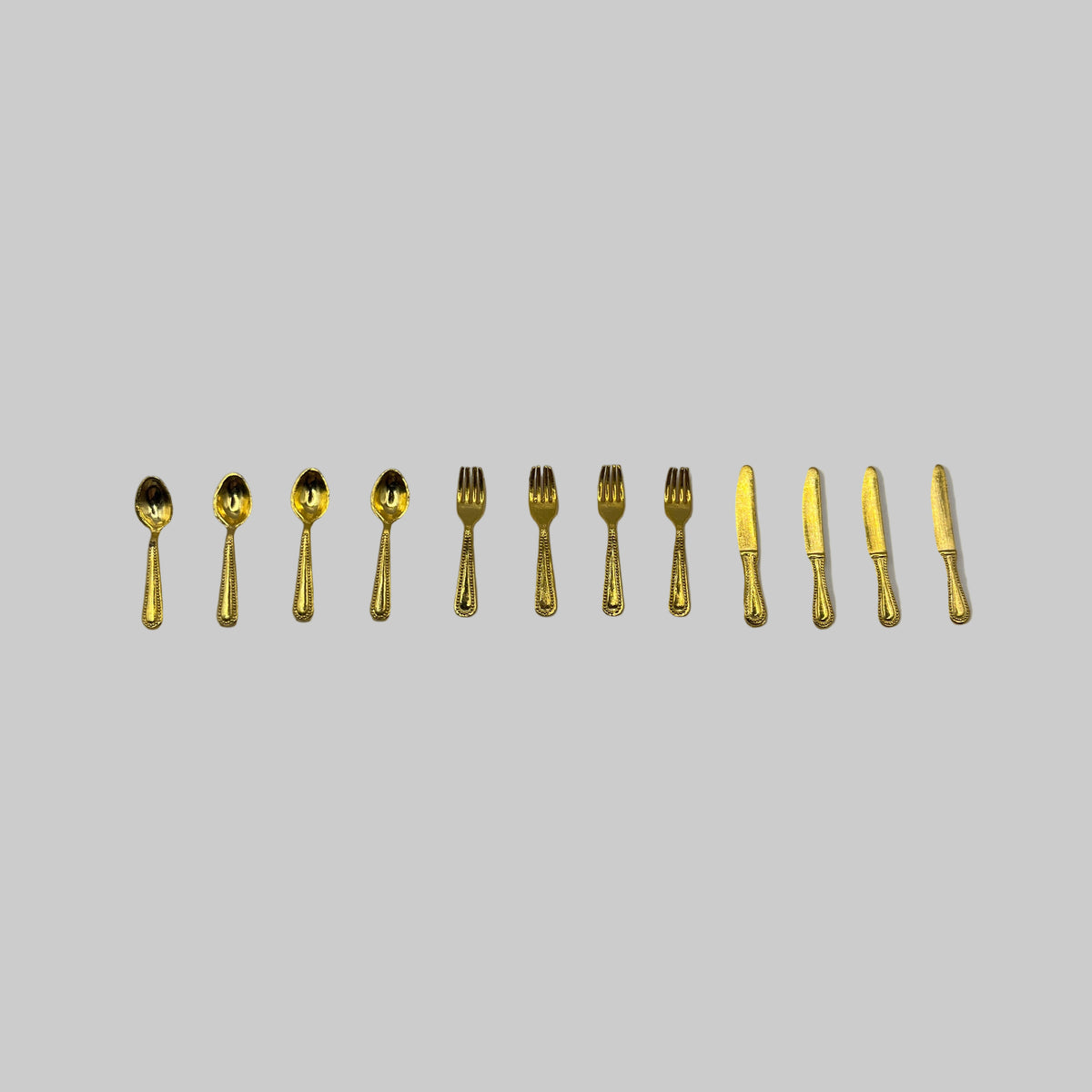 dolls house gold cutlery